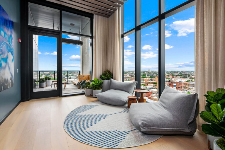 Meditation room with soft seating and calming design elements