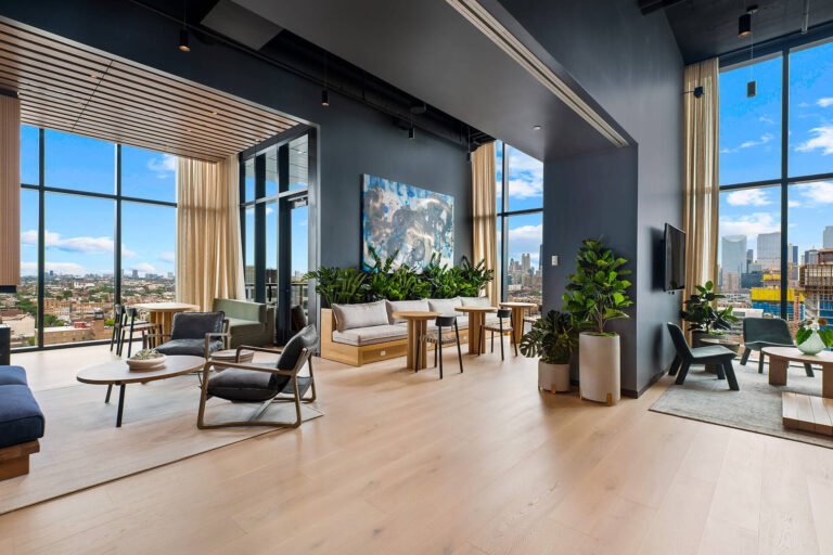 Resident lounge with contemporary seating and natural light